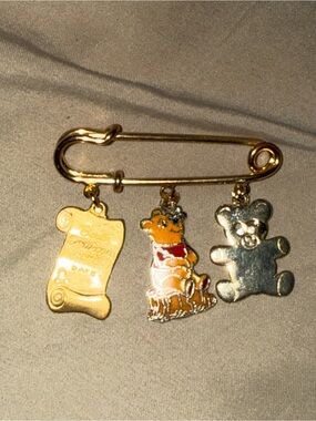 Gold Baby Safety Pin Charm Brooch with Winnie the Pooh and Teddy Charms